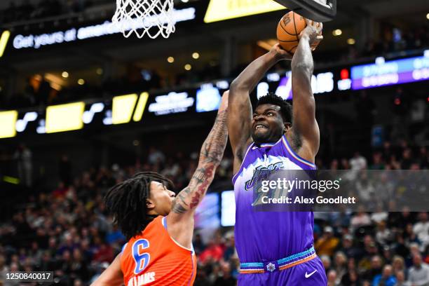 Udoka Azubuike of the Utah Jazz shoots over Jaylin Williams of the Oklahoma City Thunder during the first half of a game at Vivint Arena on April 06,...