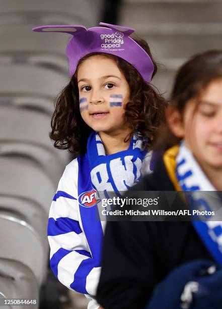 Young Kangaroos fan is seen during the 2023 AFL Round 04 match between the North Melbourne Kangaroos and the Carlton Blues at Marvel Stadium on April...