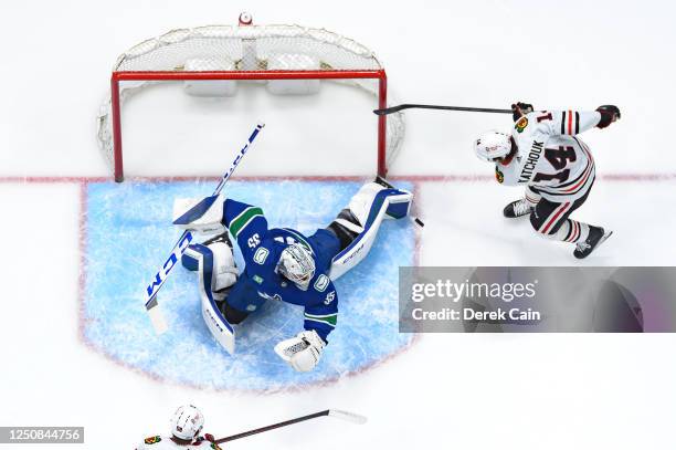 Thatcher Demko of the Vancouver Canucks makes a save on Boris Katchouk of the Chicago Blackhawks during the first period of their NHL game at Rogers...