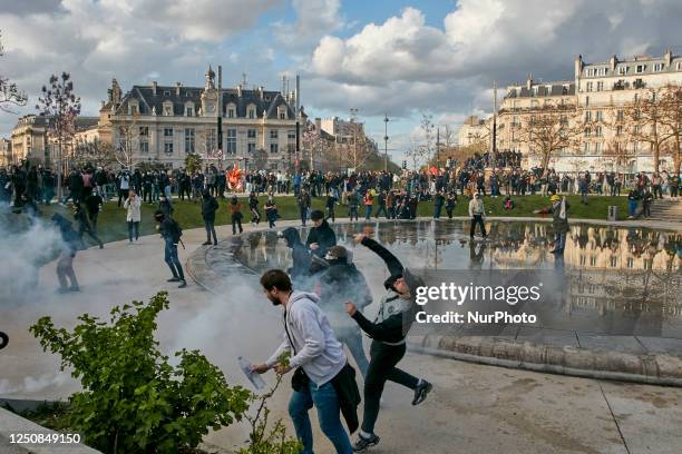 Protestors gathered for a demonstration on the 11th day of action after the government pushed a pensions reform through parliament without a vote,...