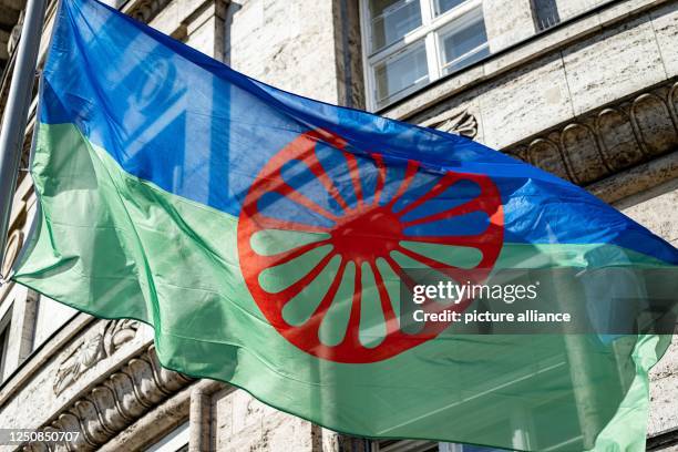 April 2023, Berlin: Before the International Roma Day, the Roma flag flies in front of the Berlin Justice Administration. From April 8 - 12 probably...