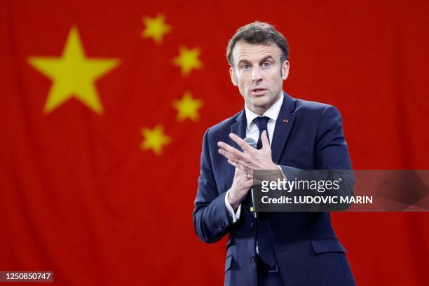 French President Emmanuel Macron gestures as he speaks to students at Sun Yat-sen University in Guangzhou on April 7, 2023.