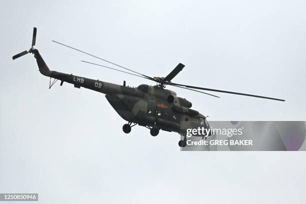 Chinese military helicopter flies over Pingtan island, the closest point to Taiwan, in China's southeast Fujian province on April 7, 2023.