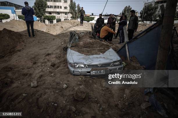 Palestinians inspect an area hit by Israeli airstrikes, on April 07, 2023 in Gaza City, Gaza.