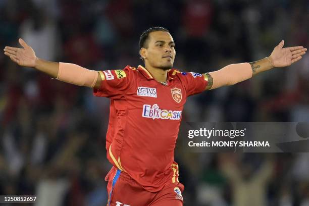 Punjab Kings' Rahul Chahar celebrate after the dismissal of Kolkata Knight Riders' Rinku Singh during the Indian Premier League Twenty20 cricket...