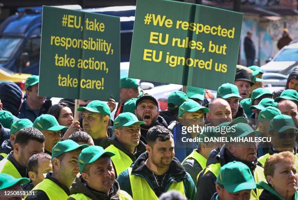 Romanian farmers protest in the front of the European Commision headquarters in Bucharest on April 7, 2023. - Farmers gather on a national-wide...