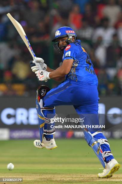 Mumbai Indians' Rohit Sharma plays a shot during the Indian Premier League Twenty20 cricket match between Royal Challengers Bangalore and Mumbai...