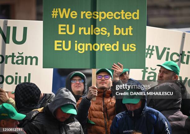 Romanian farmers protest in the front of the European Commision headquarters in Bucharest on April 7, 2023. - Farmers gather on a national-wide...