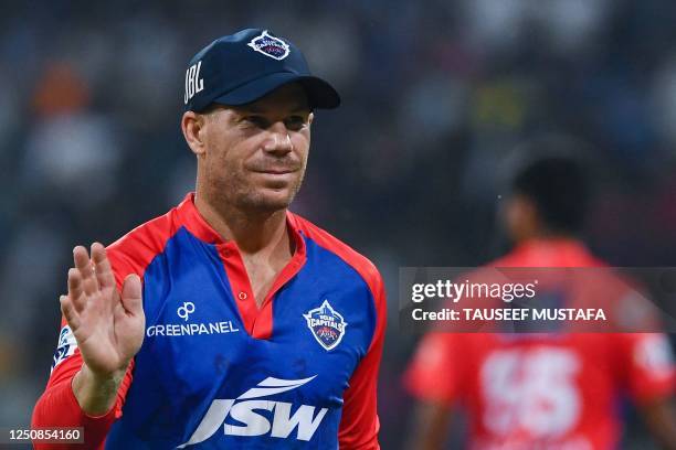 Delhi Capitals' captain David Warner gestures during the Indian Premier League Twenty20 cricket match between Lucknow Super Giants and Delhi Capitals...