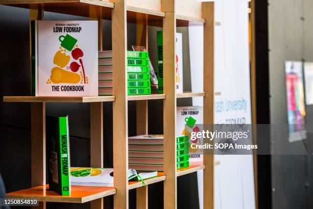 Display bookshelf with Monash University Low FODMAP cookbook being launched by Monash Publishing at Monash Arts, Design and Architecture building in...