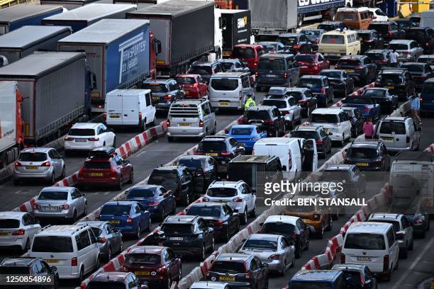 Container lorries and holiday traffic queue at the Port of Dover on the south-east coast of England before boarding ferries to mainland Europe on...