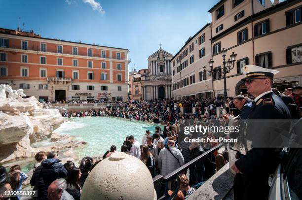 Rome, Italy, on April 7 a view of the Trevi Fountain is crowded with tourists before the Easter holidays on Good Friday .