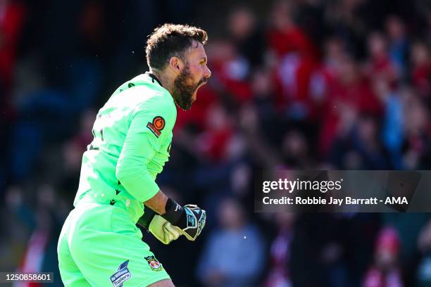 Ben Foster of Wrexham celebrates his team opening goal during the Vanarama National League fixture between FC Halifax Town and Wrexham AFC at MBi...