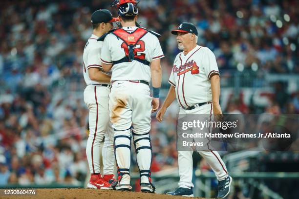 Rick Kranitz, Sean Murphy and Spencer Strider of the Atlanta Braves during a mound visit in the 5th inning against the San Diego Padres in the Braves...