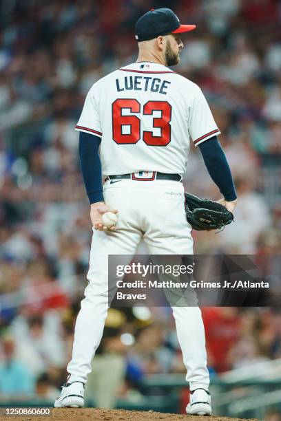 Lucas Luetge of the Atlanta Braves pitches during the 6th inning against the San Diego Padres in the Braves season home opener at Truist Park on...