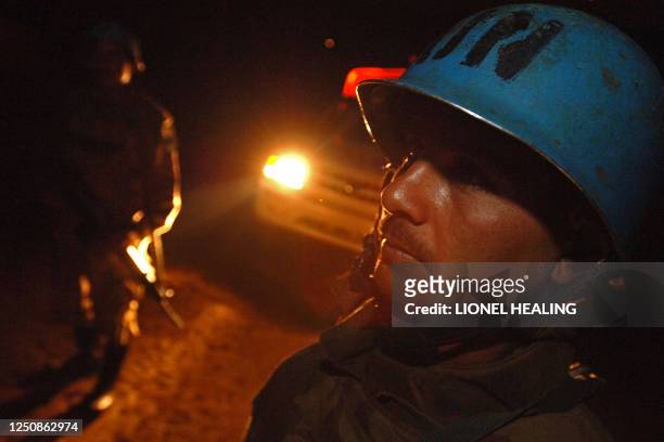 Pakistani UN peacekeepers patrol the streets at night, 13 April 2006, in Bukavu. More than 1400 peacekeepers could be deployed in Katanga, south...