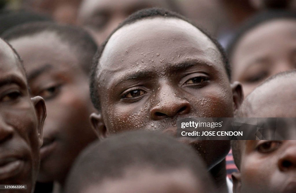 X Rwandan TOPSHOT - Rwandan men attend the ceremony marking the 1994 genocide ...
