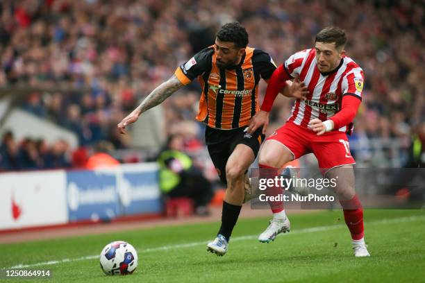 Hull City's Allahyar Sayyadmanesh I tackled by Sunderland's Lynden Gooch during the Sky Bet Championship match between Sunderland and Hull City at...