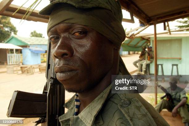 Rebel soldier posts the guard in a street of Bouake 29 September 2002 as rumours circulated in the occupied central-Ivorian city of an imminent...