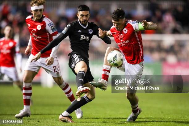 Dublin , Ireland - 7 April 2023; Joe Redmond of St Patrick's Athletic in action against Daniel Krezic of Cork City during the SSE Airtricity Men's...