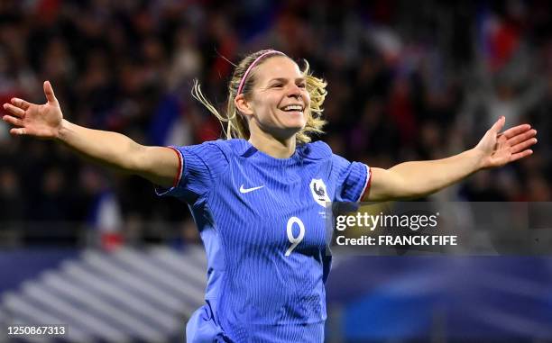 France's forward Eugenie Le Sommer celebrates after scoring during the women's international friendly football match between France and Colombia at...