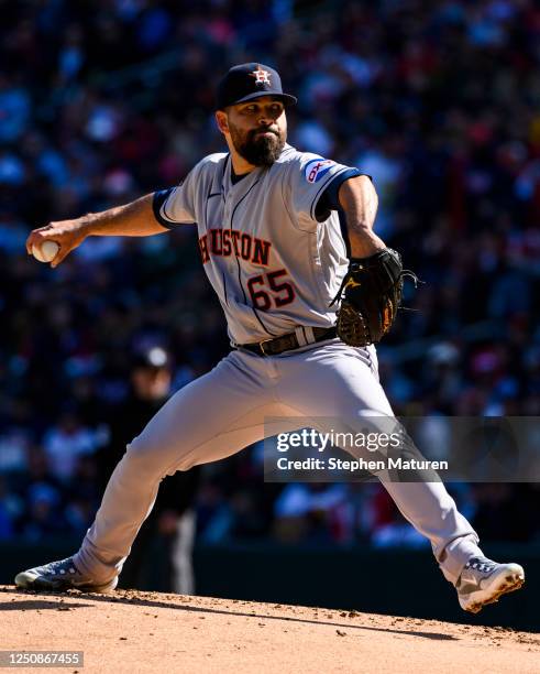 Jose Urquidy of the Houston Astros pitches during the first inning of the home opener against the Minnesota Twins at Target Field on April 7, 2023 in...