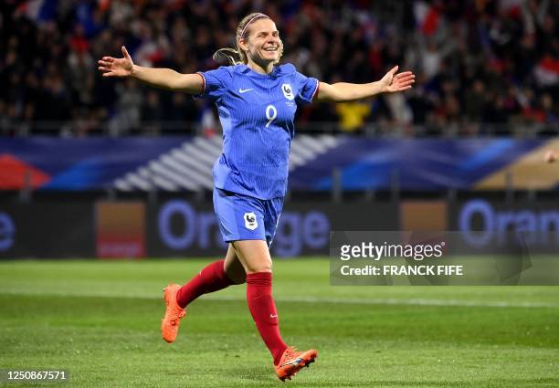 France's forward Eugenie Le Sommer celebrates after scoring during the women's international friendly football match between France and Colombia at...