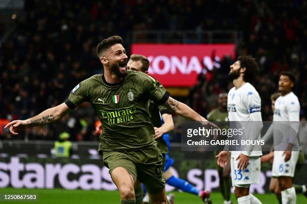 Milan's French forward Olivier Giroud reacts after a goal then disallowed for a handball during the Italian Serie A football match between AC Milan...