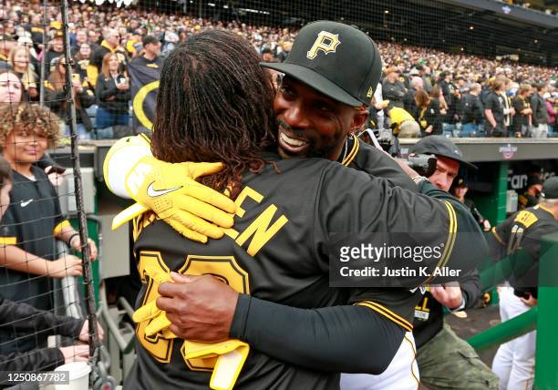 Andrew McCutchen of the Pittsburgh Pirates hugs his mother Petrina McCutchen before inter-league play against the Chicago White Sox on Opening Day at...