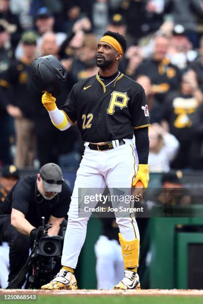 Andrew McCutchen of the Pittsburgh Pirates tips his helmet to fans in the first inning during the game between the Chicago White Sox and the...
