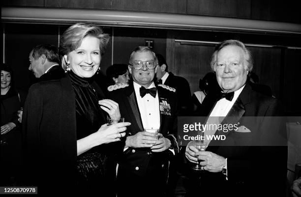 Diane Sawyer, guest, and Roone Arledge attends the ABC News Reception before the 1995 Washington Press Club Foundation Dinner on January 25, 1995 in...