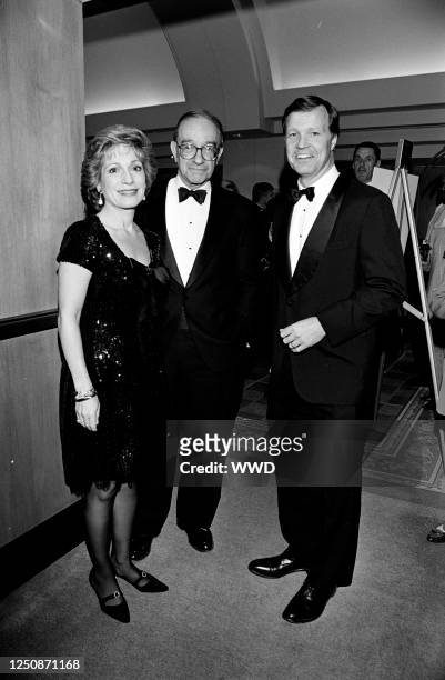 Andrea Mitchell, Alan Greenspan, and guest attend the ABC News Reception before the 1995 Washington Press Club Foundation Dinner on January 25, 1995...