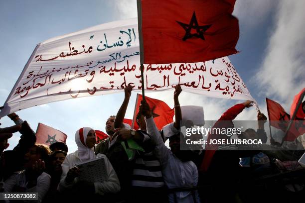 People demonstrate against the visit of the King Juan Carlos to the Spanish North African enclave of Ceuta, at the border between Morocco and Spain,...