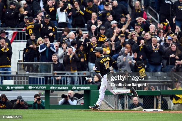 Bryan Reynolds of the Pittsburgh Pirates rounds the bases after hitting a three-run home run in the fourth inning during the game between the Chicago...