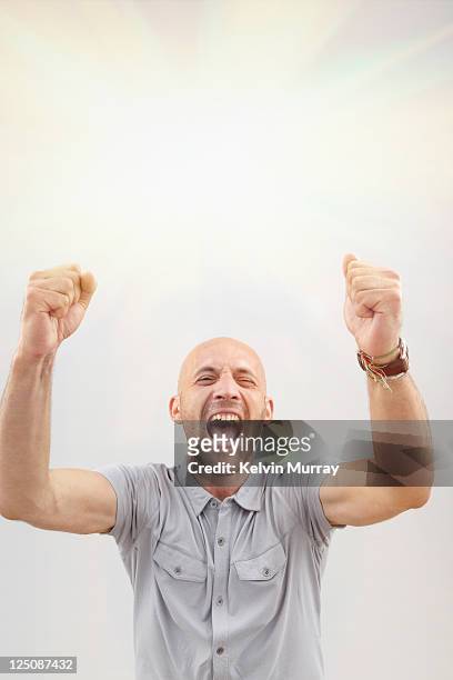 emotion - man cheering stock pictures, royalty-free photos & images