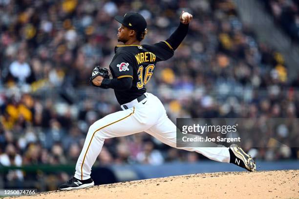 Dauri Moreta of the Pittsburgh Pirates pitches in the fifth inning during the game between the Chicago White Sox and the Pittsburgh Pirates at PNC...