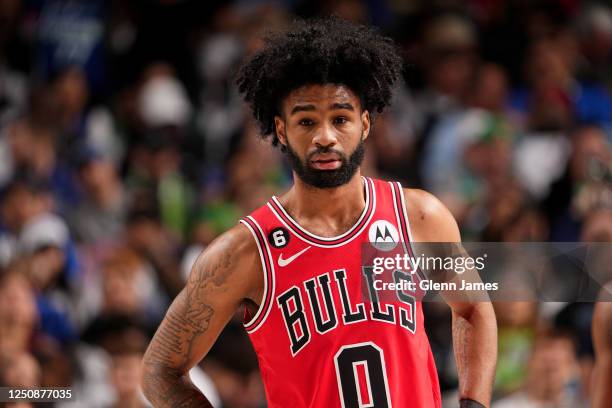 Coby White of the Chicago Bulls looks on during the game against the Dallas Mavericks on April 7, 2023 at the American Airlines Center in Dallas,...