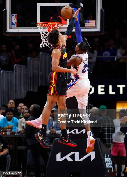 Danuel House Jr. #25 of the Philadelphia 76ers goes up for a shot against Jalen Johnson of the Atlanta Hawks during the second half at State Farm...