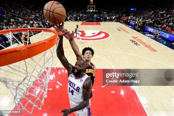 Dewayne Dedmon of the Philadelphia 76ers drives to the basket during the game against the Atlanta Hawks on April 7, 2023 at State Farm Arena in...