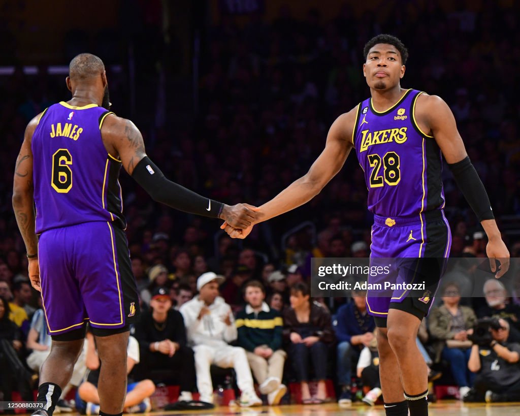 Rui Hachimura and LeBron James of the Los Angeles Lakers high fives... News  Photo - Getty Images