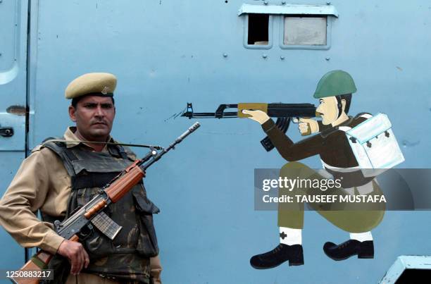 An Indian Central Reserve Police Force soldier stands guard at Lal Chowk in Srinagar on October 5, 2008 after the square was barricaded to prevent...