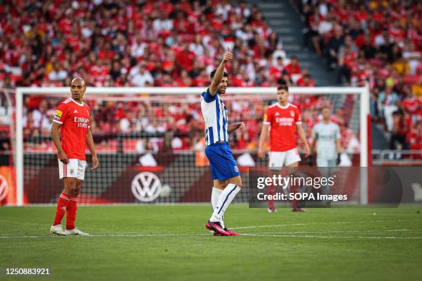 Mehdi Taremi of FC Porto celebrates after scoring a goal during the Liga Portugal Bwin match between SL Benfica and FC Porto at Estadio da Luz in...