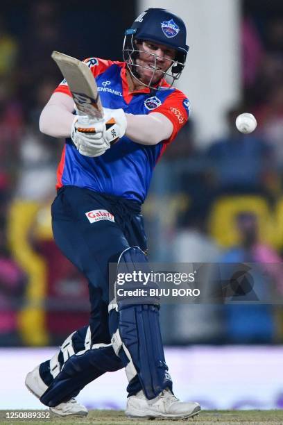 Delhi Capitals' captain David Warner plays a shot during the Indian Premier League Twenty20 cricket match between Rajasthan Royals and Delhi Capitals...