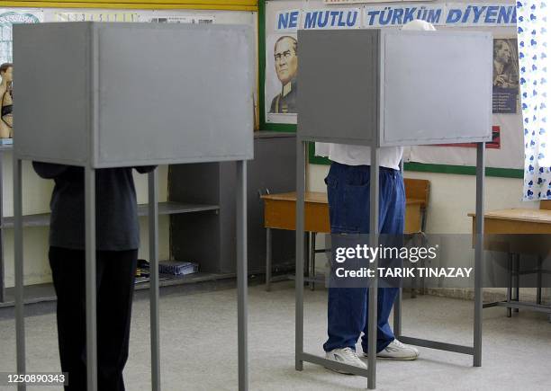 Turkish Cypriots cast their votes in a referendum on a UN peace plan designed to end Cyprus' three decade partition before it joins the European...