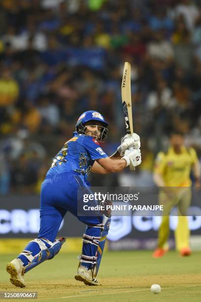 Mumbai Indians' Ishan Kishan plays a shot during the Indian Premier League Twenty20 cricket match between Mumbai Indians and Chennai Super Kings at...