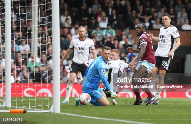 Fulham's Harrison Reed scores an own goal for West Ham United's first goal during the Premier League match between Fulham FC and West Ham United at...
