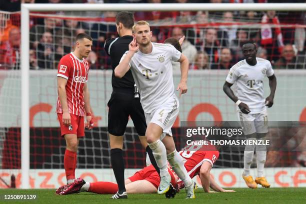 Bayern Munich's Dutch defender Matthijs de Ligt celebrates scoring the opening goal during the German first division Bundesliga football match...