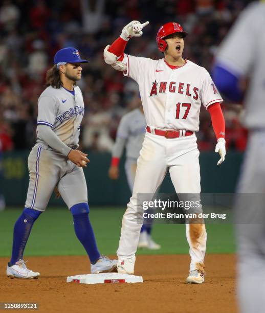 Shohei Ohtani celebrates a double in 8th inning as the Angels play the Blue Jays at Angel Stadium of Anaheim on Friday, April 7, 2023 in Anaheim, CA.