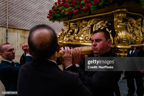 Bearer of the statue of Our Lady Desolate in procession in Canosa di Puglia, April 8, 2023. In Canosa di Puglia, Holy Saturday ends with the...