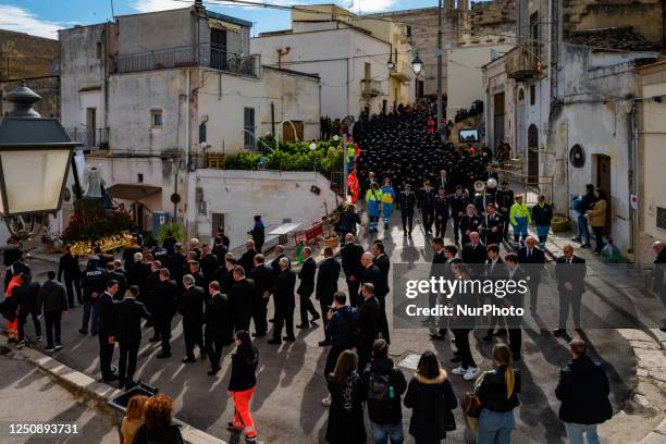 Three hundred women dressed in black with their faces covered in procession in Canosa di Puglia, April 8, 2023. In Canosa di Puglia, Holy Saturday...